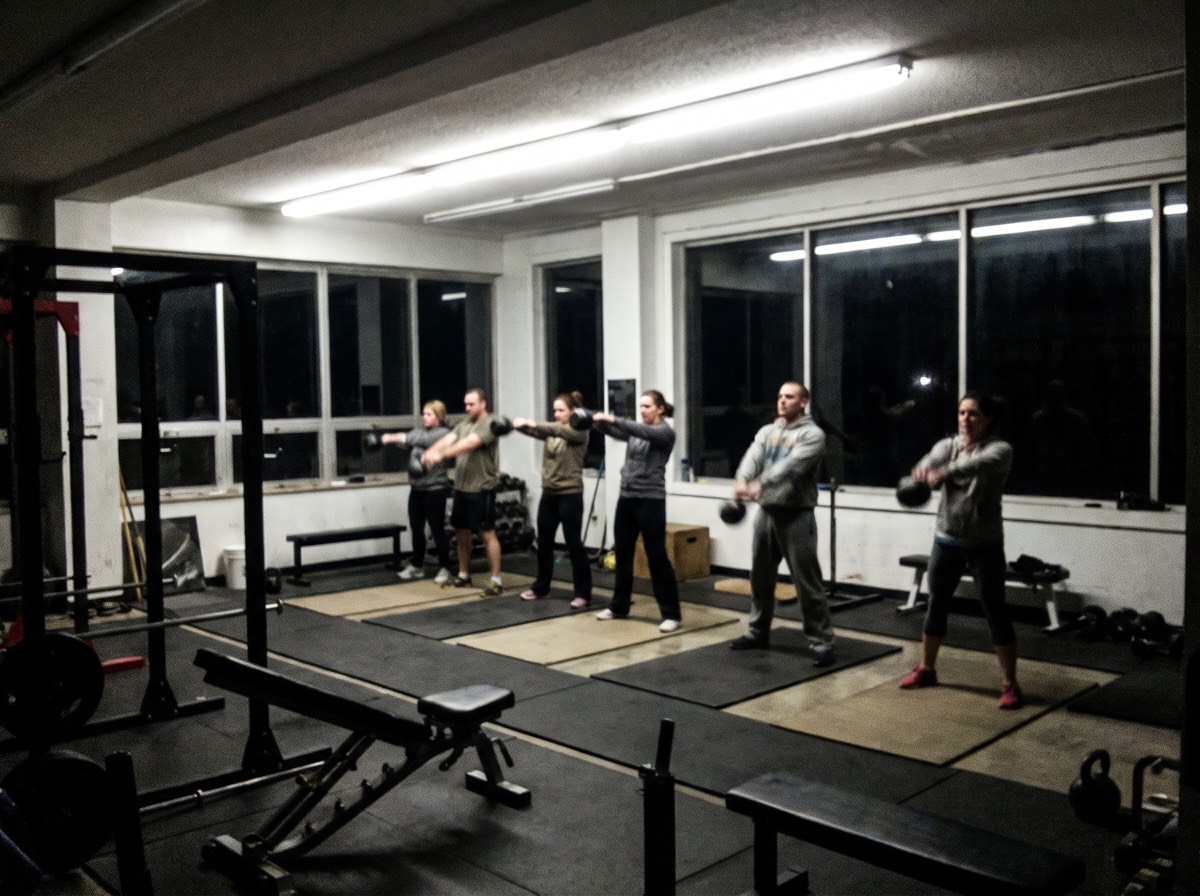 The 5:45 a.m. class in December, taken by a coach from the back. Six people.