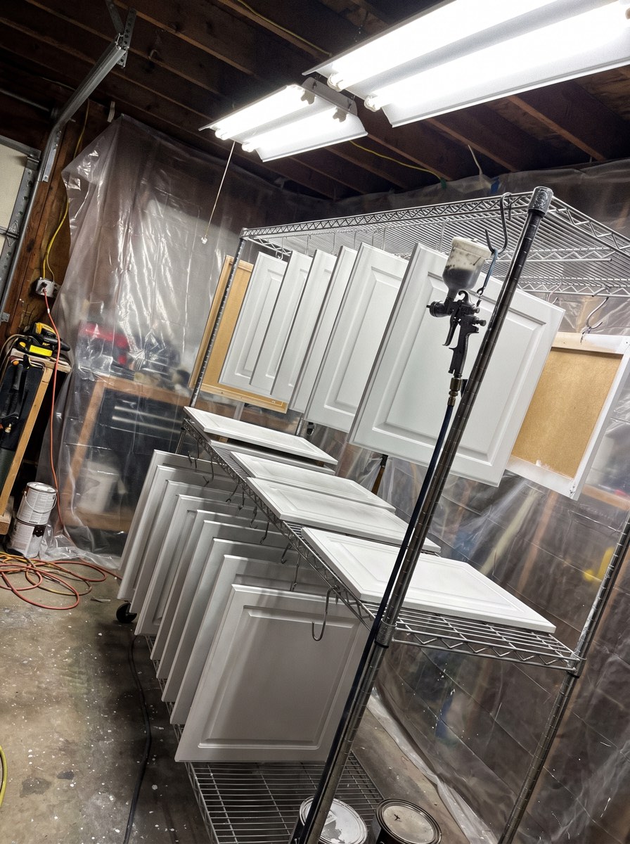 Doors drying on racks in the shop, the part of the job homeowners never see.